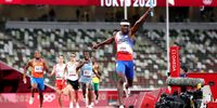 TOKYO, JAPAN - AUGUST 07: Rai Benjamin of Team United States celebrates winning the gold medal as he crosses the finish line in the Men's 4 x 400m Relay Final on day fifteen of the Tokyo 2020 Olympic Games at Olympic Stadium on August 07, 2021 in Tokyo, Japan. (Photo by Patrick Smith/Getty Images)