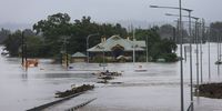 SYDNEY, AUSTRALIA - MARCH 22: The Windsor Bridge is seen submerged under rising floodwaters along the Hawkesbury River on March 22, 2021 in Sydney, Australia. Evacuation warnings are in place for parts of Western Sydney as floodwaters continue to rise. (Photo by Lisa Maree Williams/Getty Images)