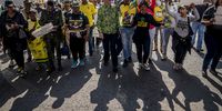 Carl Niehaus (middle of image) together with a group of ANC members march down a street towards Luthuli House to hand over a memorandum asking for Cyril Ramaphosa to step down as South African President in Johannesburg, on 15 July 2022. (Photo: Shiraaz Mohamed)