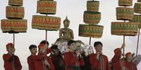 Thai dancers carry a Buddha statue as they perform during the ceremony to celebrate the recognition of the Songkran after the festival is announced as Intangible Cultural Heritage by Unesco, in Bangkok, Thailand, 07 December 2023. The 18th UNESCO’s Intergovernmental Committee meeting in the Republic of Botswana on 06 December inscribed the Songkran festival of Thailand, or the traditional Thai New Year Festival, on its Representative List of Intangible Cultural Heritage of Humanity.  EPA-EFE/NARONG SANGNAK
