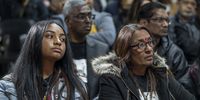 Babita Deokaran’s sister Sharlene Ramgoolam (right) and Deokaran’s daughter Thia during the ceremony. (Photo: Shiraaz Mohamed)