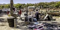 The trading area at the entrance to Masiphumelele is not a dignified place to operate a business. (Photo: Daniel Steyn)