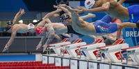 epa09362400 Adam Peaty (red cap) of Great Britain competes in the men's 100m Breaststroke Heats during the Swimming events of the Tokyo 2020 Olympic Games at the Tokyo Aquatics Centre in Tokyo, Japan, 24 July 2021.  EPA-EFE/Patrick B. Kraemer