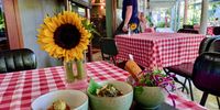 Picture-perfect lunchtime scene with tasters of frittata di patata al fungi, prawn arancini and caprese salad. (Photo: Wanda Hennig)