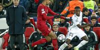 Coach Carlo Ancelotti of Real Madrid, Joel Matip of Liverpool FC and Vinicius Junior of Real Madrid during their 2023 Champions League clash. (Photo: David S Bustamante / Soccrates / Getty Images)