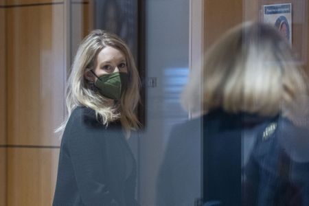 Holmes Paints Herself as Visionary, Leaves Out Damning Details