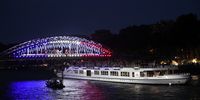 Athletes of Team France pass under  the Debilly Footbridge illuminated with the french flag colours during the opening ceremony of the Olympic Games Paris 2024 on July 26, 2024 in Paris, France. (Photo by Alex Broadway/Getty Images)