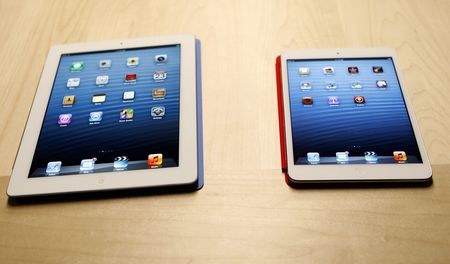 Apple unwraps mini-iPad to take on Amazon, Google