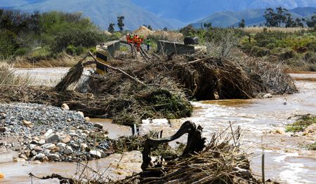 Storm-ravaged, waterlogged districts count their losses as volunteers rush to nourish communities crippled by devastation