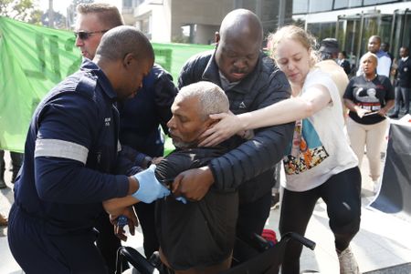 Climate activists, journalist forcibly ejected from Standard Bank HQ anti-fossil fuel protest