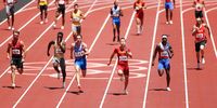 TOKYO, JAPAN - AUGUST 05: Athletes compete in round one of the Men's 4 x 100m Relay heats on day thirteen of the Tokyo 2020 Olympic Games at Olympic Stadium on August 05, 2021 in Tokyo, Japan. (Photo by David Ramos/Getty Images)