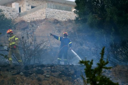 Greek firefighters battle deadly wildfires on Crete for a second day