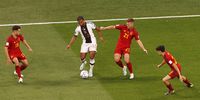epa10333147 Serge Gnabry of Germany (2-L) in action against Jordi Alba (L), Dani Olmo (2-R), and Pedri (R) of Spain during the FIFA World Cup 2022 group E soccer match between Spain and Germany at Al Bayt Stadium in Al Khor, Qatar, 27 November 2022.  EPA-EFE/Rungroj Yongrit