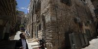 An Israeli man walks in an alley near the Sub-Laban family home in the Muslim quarter of Jerusalem's Old City, 12 June 2023. Nora and Mustafa Sub-Laban are facing the risk of eviction from their home in Jerusalem's Old City after decades of legal dispute over the property that began in 1978. In 2023, the Israeli Supreme Court ruled in favor of a group of Jewish settlers and ordered that the eviction of the elderly Palestinian couple is to be carried out. Nora and Mustafa Sub Laban expect they could be evicted anytime.  EPA-EFE/ATEF SAFADI