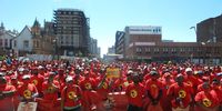 Vuyisile Mini Square in Gqeberha was a sea of red as Numsa members gathered on Tuesday to mark the start of the strike by steel engineering workers. (Photo: Joseph Chirume)
