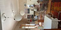 The main reception room with its eclectic mix of styles from the seventies and nineteenth century. (Photo: Supplied)<br>