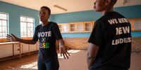 Community activists Nozipho Moremongwe and Dithapelo Mareth Pokola inside an unused classroom at the Relebogile Secondary School in Khutsong that has been closed for more than a year because of sinkhole damage. (Photo: Chris Collingridge)