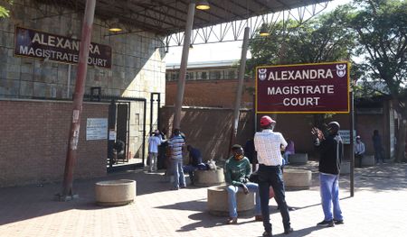 In the dock – 12 men appear in court following killing spree in Alex