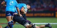 Cameron Hanekom of the Vodacom Blue Bulls tackled during the United Rugby Championship final match between Vodacom Bulls and Glasgow Warriors at Loftus Versfeld on June 22, 2024 in Pretoria, South Africa. (Photo by Gordon Arons/Gallo Images/Getty Images)