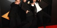 LOS ANGELES, CALIFORNIA - FEBRUARY 04: (FOR EDITORIAL USE ONLY) (L-R) Chang Yu Chung, Yu Wei and Li Jheng-han attend the 66th GRAMMY Awards at Crypto.com Arena on February 04, 2024 in Los Angeles, California. (Photo by Frazer Harrison/Getty Images)
