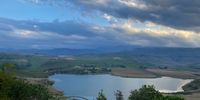 Tranquility. Bell Park Dam with Drakensberg as the backdrop, KZN.