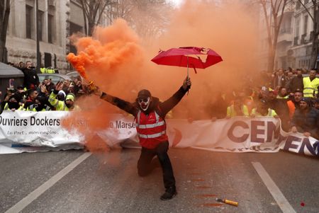 Striking unions cripple France in stand-off with Macron
