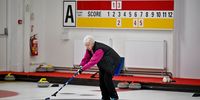 HOWOOD, SCOTLAND - FEBRUARY 09: A lady curler from Druids Club curls at Greenacres Curling Club  on February 9, 2022 in Howood, Scotland. Curling has been a popular game in Scotland dating back to the 16th century when it was played on frozen lochs making it one of the world’s oldest team sports. It was officially made a Winter Olympic sport at  Nagano 1998.  Greenacres Curling Club is the home of Rhona Martin M.B.E, part of the all-Scot team that won gold at the 2002 Salt Lake City Winter Olympics. Stones manufactured at Kays Curling in Ayrshire are sent to Greenacres for testing before being sent to the Winter Olympics.  (Photo by Jeff J Mitchell/Getty Images)