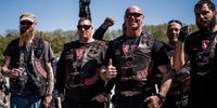 Members of the 'Night Wolves' biker group pose for a photo as they attend Victory Day commemorations at the Soviet World War II memorial at Tiergarten park in Berlin, Germany, 09 May 2023. World War II in Europe ended with the unconditional surrender of Nazi Germany on all fronts on 09 May 1945.  EPA-EFE/CLEMENS BILAN