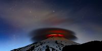 A double lenticular cloud is illuminated at nightfall by the lava emitted from the Villarrica volcano, Chile. Villarica is in the town of Pucón in the south of Chile. It’s one of the country’s most active volcanoes and last erupted in 2015. Francisco takes regular trips to Villarrica to monitor its activity. On this visit, he stayed nearby for 10 nights. He says every trip is “quite an adventure – never knowing what the volcano might surprise you with”. Some nights are calm, others furious as in this photograph, where the brightness of the crater illuminates the night sky.(Photo: Francisco Negroni (Chile) Highly commendedWildlife Photographer of the YearNatural History Museum, London)