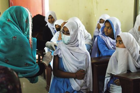 Omicron surge across the globe sparks fears health systems will be overwhelmed