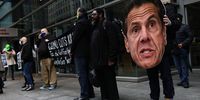 NEW YORK, NEW YORK - MARCH 01: People gather outside of Gov. Andrew Cuomo’s NYC office to protest against cuts to health care on March 01, 2021 in New York City. On the one-year anniversary of the first coronavirus (COVID-19) diagnosis in NYC, grassroots organizations gathered as part of the “Invest In Our NY campaign!” demanding Gov. Cuomo and NYS lawmakers stop the cuts from HIV/AIDS and other healthcare service and pass bills that would raise revenue and help to restore money to Medicaid, cancel rent for low-income New Yorkers and protect vulnerable communities. (Photo by Michael M. Santiago/Getty Images)