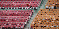 INCHEON, SOUTH KOREA - MAY 05: (EDITORIAL USE ONLY) The stands at SK Wyverns club's Happy Dream Ballpark, are filled with placards featuring their fans during the Korean Baseball Organization (KBO) League opening game between SK Wyverns and Hanwha Eagles at the empty SK Happy Dream Ballpark on May 05, 2020 in Incheon, South Korea. The 2020 KBO season started after being delayed from the original March 28 Opening Day due to the coronavirus (COVID-19) outbreak. The KBO said its 10 clubs will be able to expand their rosters from 28 to 33 players in 54 games this season, up from the usual 26. Teams are scheduled to play 144 games this year. As they prepared for the new beginning, 10 teams managers said the season would not be happening without the hard work and dedication of frontline medical and health workers. South Korea is transiting this week to a quarantine scheme that allows citizens to return to their daily routines under eased guidelines. But health authorities are still wary of "blind spots" in the fight against the virus cluster infections and imported cases. According to the Korea Center for Disease Control and Prevention, 3 new cases were reported. The total number of infections in the nation tallies at 10,804. (Photo by Chung Sung-Jun/Getty Images)