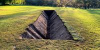 Listen to Me is a sound sculpture by Christophe Fellay, enlarging the groove of a vinyl record and etching it into the earth. (Photo: Soil & Water)