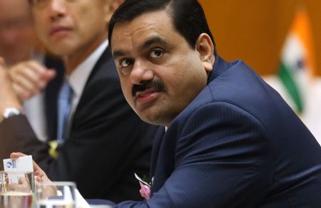 Billionaire Gautam Adani of India's Adani Group charged in US with bribery; bond deal pulled