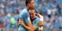 Diego Laxalt of Uruguay (R) celebrates scoring the 2-0 with Sebastian Coates of Uruguay during the FIFA World Cup 2018 group A preliminary round soccer match between Uruguay and Russia in Samara, Russia, 25 June 2018. EPA-EFE/TATYANA ZENKOVICH 