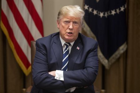 Under fire, Trump says he misspoke on Russia election meddling