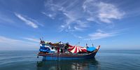 Rohingya refugees take a rest on their wooden boat that is stranded and adrift in the Labuhan Haji sea area, South Aceh, Indonesia, 23 October 2024. More than 100 Rohingya refugees are adrift in the coastal region of Labuhan Haji Port, South Aceh. Local authorities have not yet given their craft permission to land due to a wave of rejection from residents. According to the Head of Public Relations for the Aceh Police, Joko Krisdianto, the police are currently still investigating the human trafficking case involving the Rohingya ethnic group and local Acehnese residents who are involved as smuggling agents.  EPA-EFE/HOTLI SIMANJUNTAK