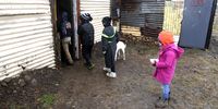 Children queue outside a pop-up soup kitchen in Nkanini, an informal settlement in Makhanda. (Photo: Black Star / Spotlight)