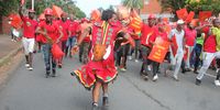 EFF supporters march along Pixley Ka Seme Street in Durban amid tight police security. (Photo: Phumlani Thabethe)