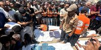 People pray in front of the bodies of Palestinians killed in an Israeli airstrike at Nasser Hospital in Khan Younis, southern Gaza Strip, 25 August 2025. According to the Palestinian Health Ministry, the airstrike hit the fourth floor of the Nasser Medical Complex, followed by a second attack upon the arrival of ambulance crews to retrieve the injured and the dead, leaving at least 20 killed, including 5 journalists.  (Photo: EPA / Haitham Imad)