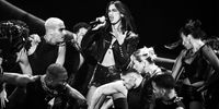 LONDON, ENGLAND - MARCH 02:  (EDITORIAL USE ONLY. NO PUBLICATIONS DEVOTED EXCLUSIVELY TO THE ARTIST) (EDITORS NOTE: Image has been converted to black and white) Dua Lipa performs on stage during the BRIT Awards 2024 at The O2 Arena on March 02, 2024 in London, England. (Photo by Gareth Cattermole/Getty Images)