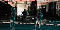 Members of the South African National Defence Force (SANDF) patrol damaged shops in KwaDabeka, Durban, after several supermarkets were looted on 30 June 2026,(Photo: Felix Dlangamandla)