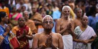 Hindu devotees offer prayers to Lord Narasimha Swamy during a chariot procession on the occasion of the Aani Narasimha Brahmotsavam festival, at Parthasarathy temple, in Chennai, India, 03 July 2023. Hundreds of Hindu devotees take part in a chariot procession by chanting sacred Vedas and offering prayers on the occasion of the Aani Narasimha Brahmotsavam festival of Lord Narasimha Swamy in the neighborhood of Triplicane, at the Parthasarathy temple, a 6th-century Hindu Vaishnavite temple dedicated to Lord Vishnu.  EPA-EFE/IDREES MOHAMMED