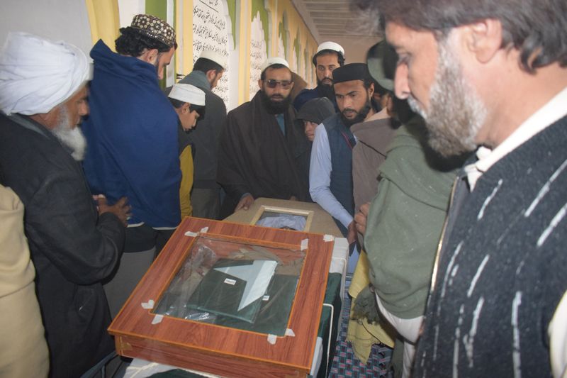 Pakistan sends helicopters, drones to end desert standoff; 58 dead