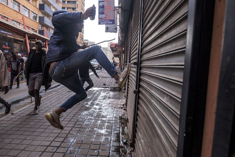 Xenophobic protests hit small businesses despite evidence migrants help grow SA’s economy