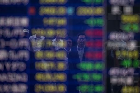 Asia shares mostly higher, yen buoyed by upbeat GDP