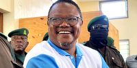 Opposition leader Tundu Lissu made sure to smile and show he was relaxed in his first hearing on treason and sedition charges, which his legal team says are trumped up. (Photo: Ikoti Lissu.)