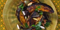 Caramelized pumpkin crescents celebrate the natural sugars in pumpkin, which is paired with a sweet-and-sour prune and onion sauce. Photo: Nikki Brighton