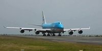 A Boeing 747-400 operated by KLM preparing for take-off at St. Maarten. (Still from https://youtu.be/san0vr6MbDU by user czposix79.)