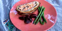 The salmon en croûte, plated up with beetroot and asparagus. (Photo: David Harrison)